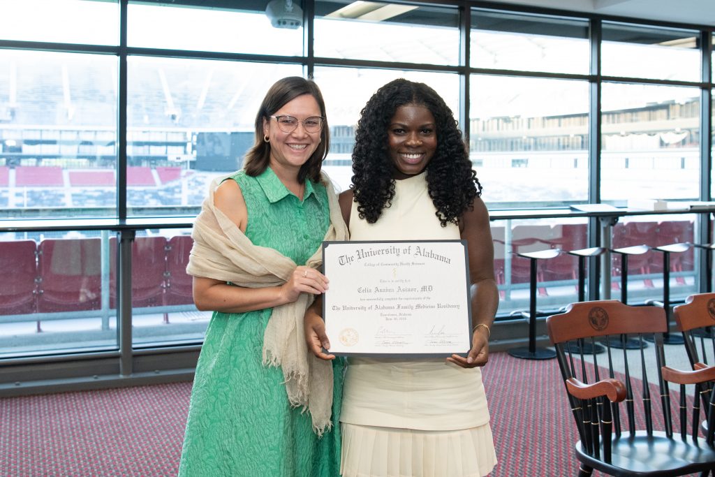 Dr. Celia Asinor with Dr. Jackie Luker, clinical assistant professor in the Department of Family, Internal, and Rural Medicine. 