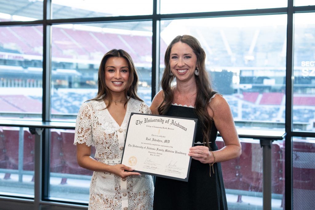 Dr. Zeel Adeshra with Dr. Cheree Melton, clinical associate professor in the Department of Family, Internal, and Rural Medicine. 