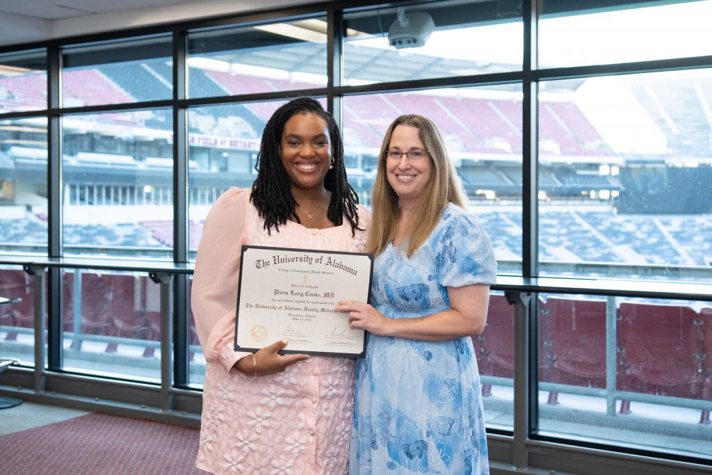 Dr. Paris Cooke with Dr. Shawnna Ogden, clinical assistant professor in the Department of Family, Internal, and Rural Medicine.  