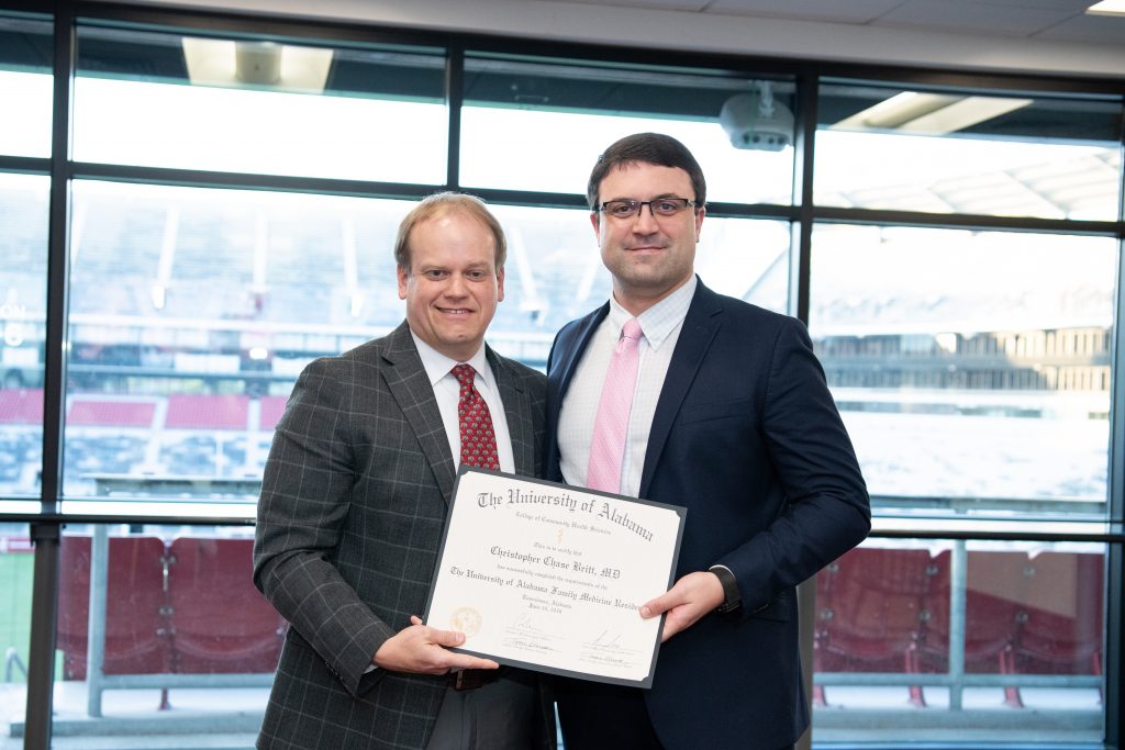Dr. Christopher Britt with Dr. Ray Stewart, clinical associate professor of sports medicine in the Department of Family, Internal, and Rural Medicine. 