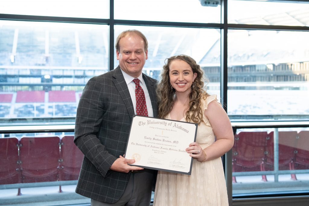Dr. Emily Brown with Dr. Ray Stewart, clinical associate professor of sports medicine in the Department of Family, Internal, and Rural Medicine. 