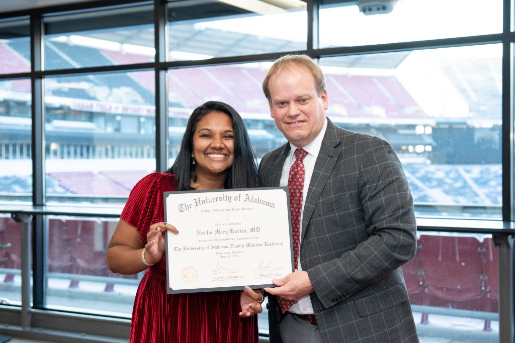 Dr. Neethu Kurien with Dr. Ray Stewart, clinical associate professor of sports medicine in the Department of Family, Internal, and Rural Medicine. 