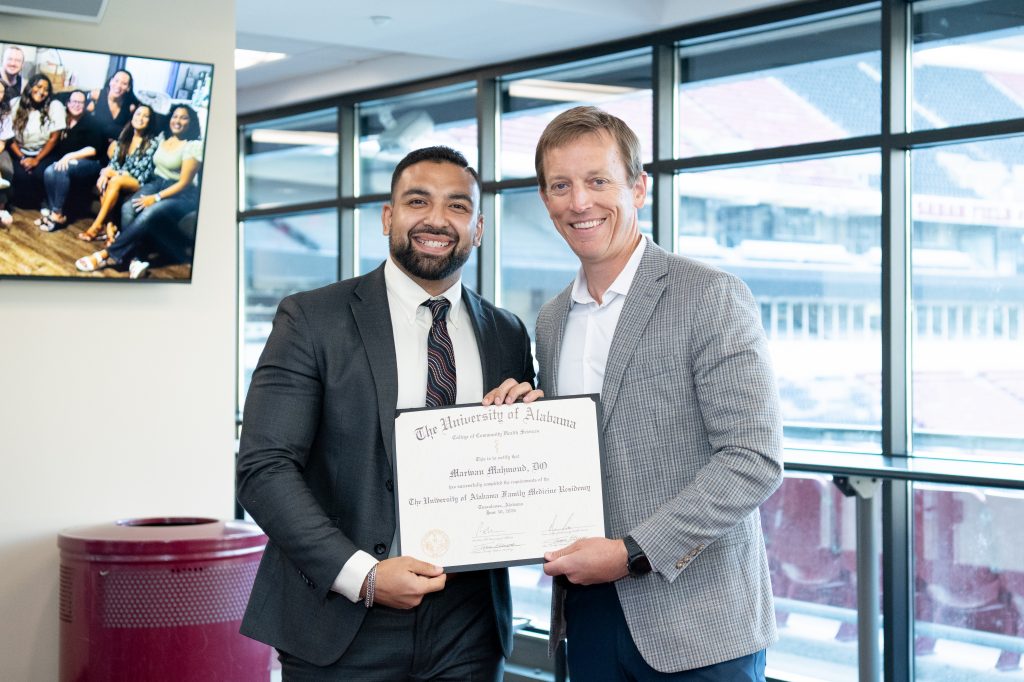 Dr. Marwan Mahmoud with Dr. Brett Bentley, clinical associate professor of sports medicine in the Department of Family, Internal, and Rural Medicine. 