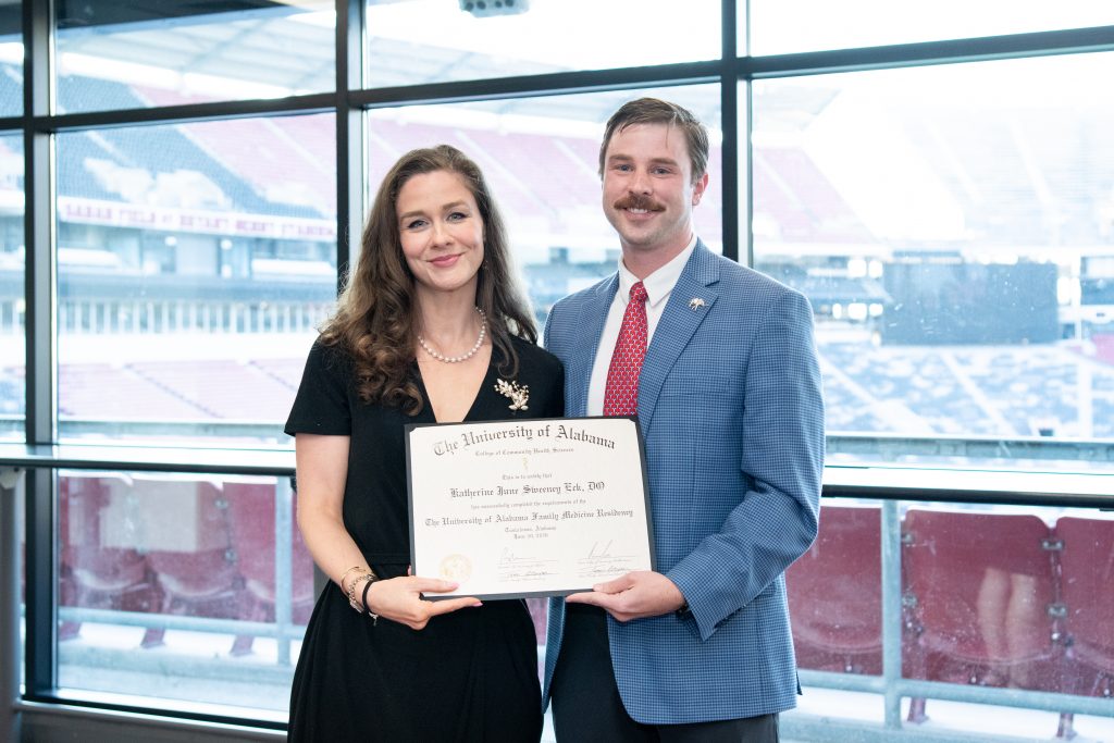Dr. Katherine Sweeney Eck with Dr. Russ Guin, assistant residency director and clinical assistant professor in the Department of Family, Internal, and Rural Medicine. 