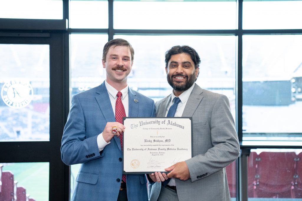 Dr. Ricky Sekhon with Dr. Russ Guin, assistant residency director and clinical assistant professor of sports medicine in the Department of Family, Internal, and Rural Medicine. 